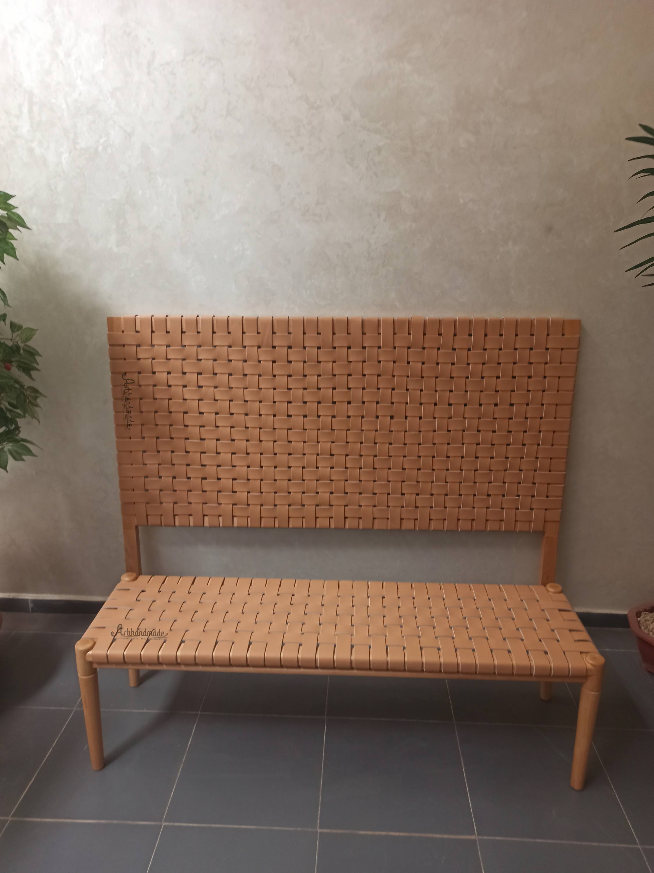 Wall-mounted leather headboard with matching bench, handcrafted from teak and premium leather.