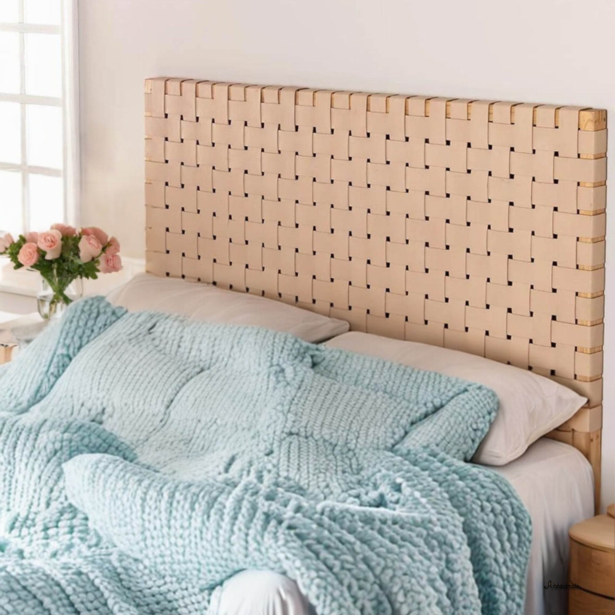 Front view of handcrafted leather and wood headboard on queen bed