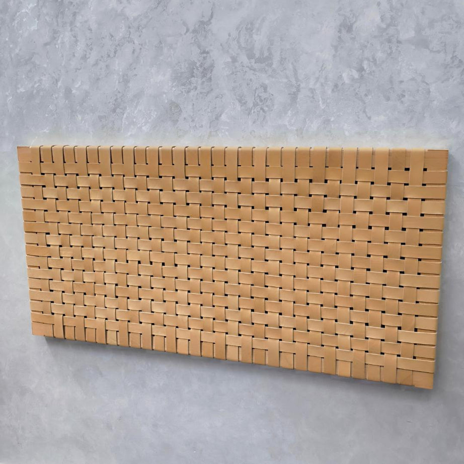Handcrafted woven strap leather headboard, full view showcasing artisanal design and premium natural leather details.